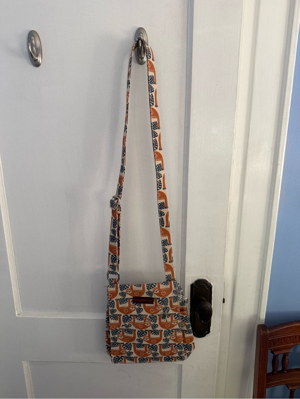 Bungalow 360 canvas crossbody bag with sloth print